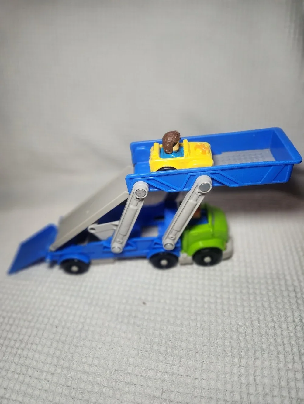 Fisher-Price Blue and Green Car Carrier with Yellow Toy Car Wheelie